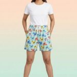 Quirky mint green lounge shorts featuring colorful ice cream and food truck illustrations.