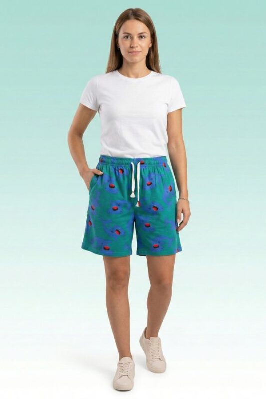 Fun teal-colored shorts with open-mouth shark pattern and adjustable drawstring waistband.