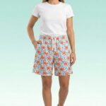 Breathable white cotton shorts with orange starfish print, ideal for summer loungewear.