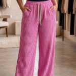 Women wearing hot pink and black vertical stripe wide leg pajama cotton blend free size