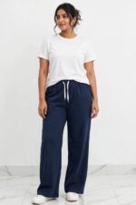 Model wearing classic navy blue relaxed palazzo lounge pajama pants