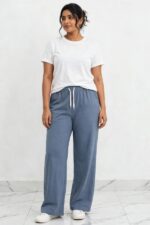 Model wearing slate blue dusty blue relaxed wide leg lounge pajama pants free size