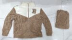 Actual brown and cream plush zip-front top with matching folded pyjamas